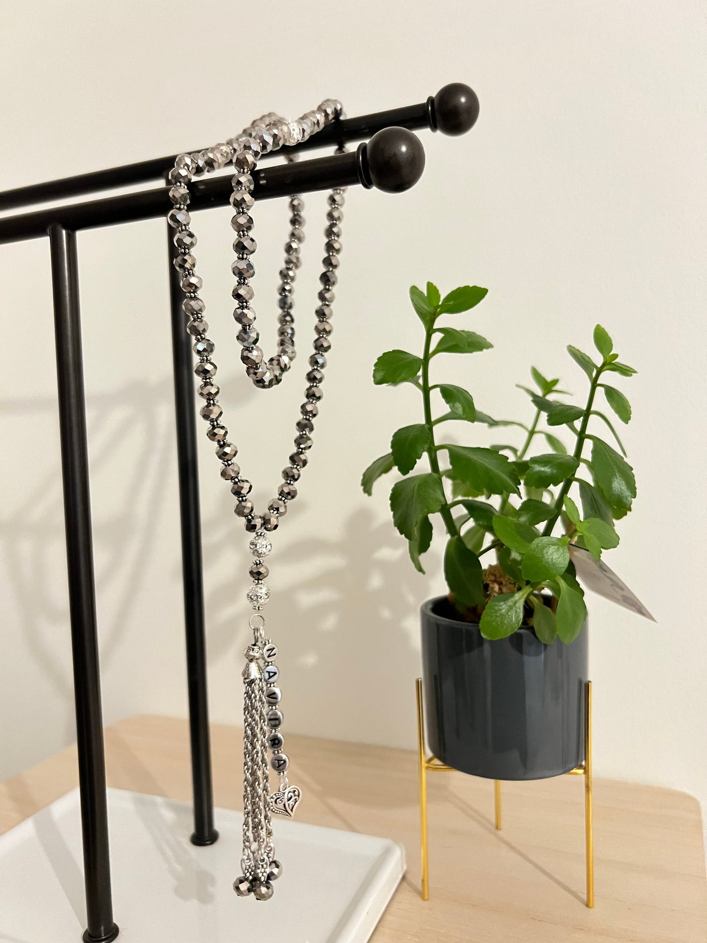 Silver Metallic tasbih shown in 33 and 99 bead sizes